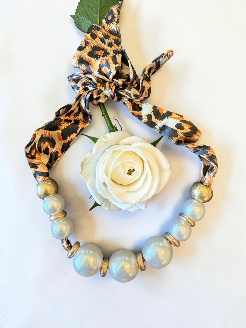 Necklace with Faux Pearls and Gold Tone Hardware.